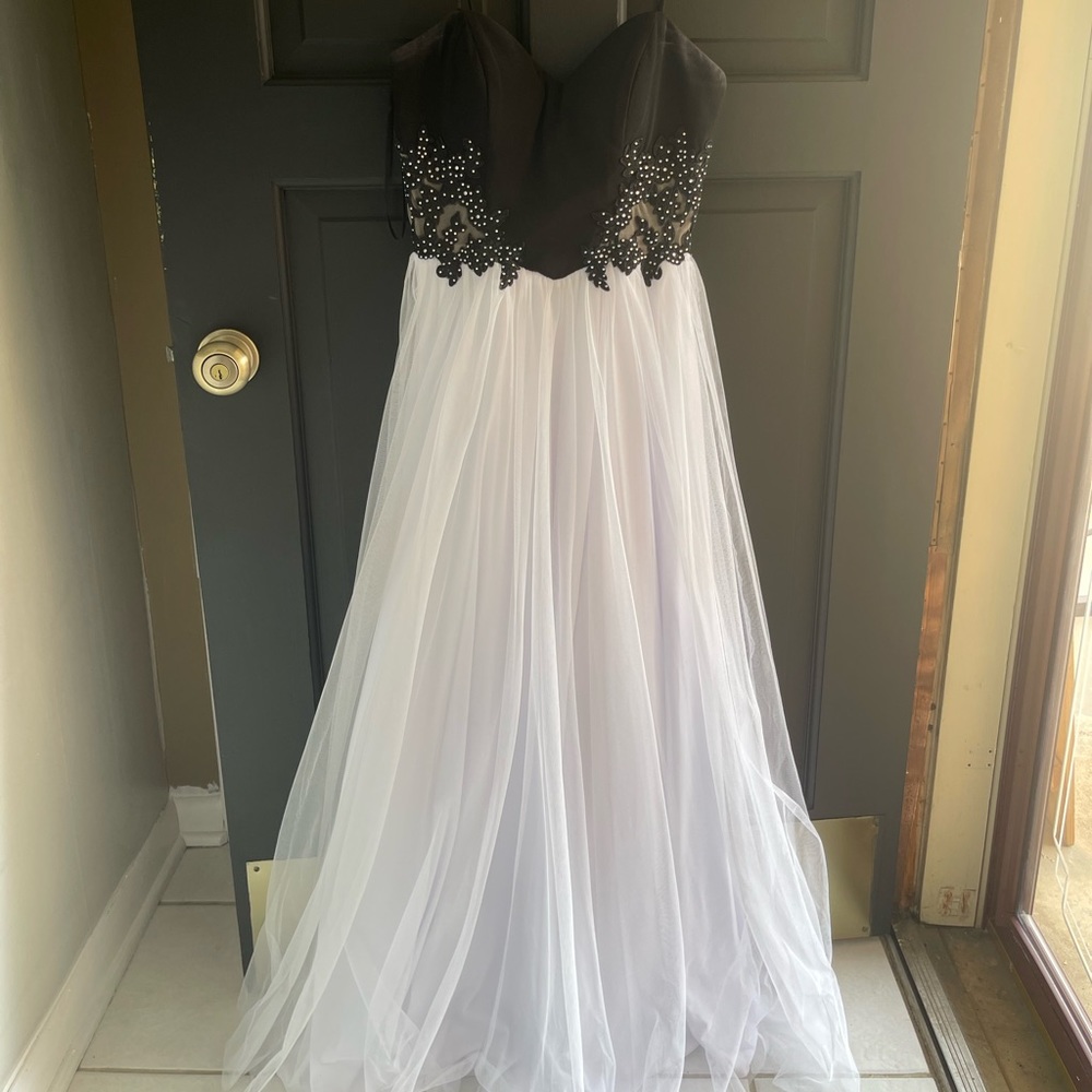 Black and white prom/formal dress. Only worn once still in perfect condition.